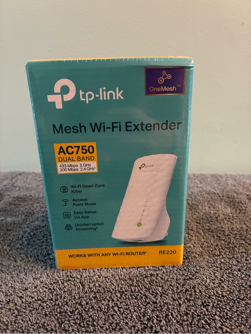 TP-Link Mesh Wi‑Fi Extender Box in Teal and Yellow